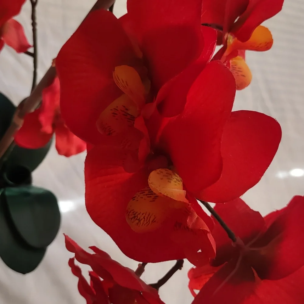 Artificial red/orange orchid🪷 arrangement